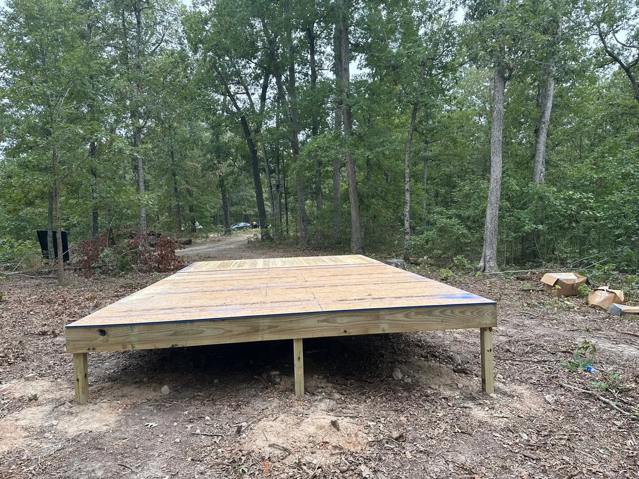 Freshly built wood platform deck at a rural property